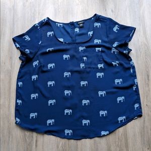Navy blue scoop neck blouse with elephant print.